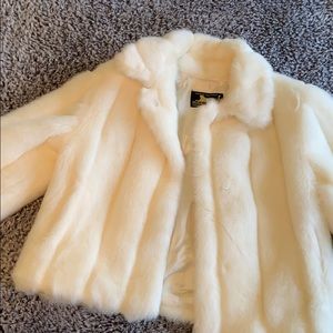 Cream colored faux fur coat